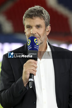 2023-08-13 - Herve Mathoux of Canal Plus during the French championship Ligue 1 football match between Paris Saint-Germain (PSG) and FC Lorient on August 12, 2023 at Parc des Princes stadium in Paris, France - FOOTBALL - FRENCH CHAMP - PARIS SG V LORIENT - FRENCH LIGUE 1 - SOCCER