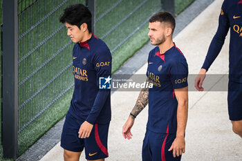 2023-08-18 - Lee KANG-IN of PSG and Lucas HERNANDEZ of PSG during the training of the Paris Saint-Germain team on August 18, 2023 at Campus PSG in Poissy, France - FOOTBALL - PARIS SG TRAINING AND PRESS CONFERENCE - FRENCH LIGUE 1 - SOCCER