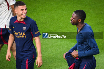 2023-08-18 - Ismael GHARBI of PSG and Ousmane DEMBELE of PSG during the training of the Paris Saint-Germain team on August 18, 2023 at Campus PSG in Poissy, France - FOOTBALL - PARIS SG TRAINING AND PRESS CONFERENCE - FRENCH LIGUE 1 - SOCCER