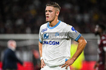 2023-08-18 - Vitor OLIVEIRA (Vitinha) of Marseille looks dejected during the French championship Ligue 1 football match between FC Metz and Olympique de Marseille on August 18, 2023 at Saint-Symphorien stadium in Metz, France - FOOTBALL - FRENCH CHAMP - METZ V MARSEILLE - FRENCH LIGUE 1 - SOCCER