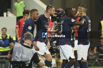 2023-08-20 - Kylian Mbappe of PSG celebrates his goal with Milan Skriniar, Ousmane Dembele during the French championship Ligue 1 football match between Toulouse FC and Paris Saint-Germain on August 19, 2023 at Stadium in Toulouse, France - FOOTBALL - FRENCH CHAMP - TOULOUSE V PARIS SG - FRENCH LIGUE 1 - SOCCER