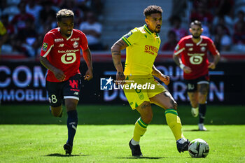 2023-08-20 - Angel GOMES of Lille and Douglas AUGUSTO of Nantes during the French championship Ligue 1 football match between LOSC Lille and FC Nantes on August 20, 2023 at Pierre Mauroy stadium in Villeneuve-d'Ascq near Lille, France - FOOTBALL - FRENCH CHAMP - LILLE V NANTES - FRENCH LIGUE 1 - SOCCER