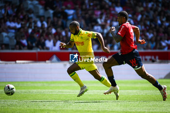 2023-08-20 - Marcus COCO of Nantes and Alexsandro VICTOR DE SOUZA RIBEIRO of Lille during the French championship Ligue 1 football match between LOSC Lille and FC Nantes on August 20, 2023 at Pierre Mauroy stadium in Villeneuve-d'Ascq near Lille, France - FOOTBALL - FRENCH CHAMP - LILLE V NANTES - FRENCH LIGUE 1 - SOCCER