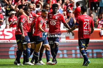 2023-08-20 - Adam OUNAS of Lille celebrate his goal with teammates during the French championship Ligue 1 football match between LOSC Lille and FC Nantes on August 20, 2023 at Pierre Mauroy stadium in Villeneuve-d'Ascq near Lille, France - FOOTBALL - FRENCH CHAMP - LILLE V NANTES - FRENCH LIGUE 1 - SOCCER