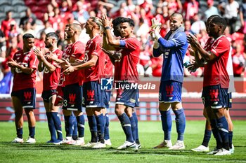 2023-08-20 - Players of Lille celebrate the victory during the French championship Ligue 1 football match between LOSC Lille and FC Nantes on August 20, 2023 at Pierre Mauroy stadium in Villeneuve-d'Ascq near Lille, France - FOOTBALL - FRENCH CHAMP - LILLE V NANTES - FRENCH LIGUE 1 - SOCCER