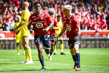 2023-08-20 - Jonathan DAVID of Lille celebrate his goal with Hakon ARNAR HARALDSSON of Lille during the French championship Ligue 1 football match between LOSC Lille and FC Nantes on August 20, 2023 at Pierre Mauroy stadium in Villeneuve-d'Ascq near Lille, France - FOOTBALL - FRENCH CHAMP - LILLE V NANTES - FRENCH LIGUE 1 - SOCCER