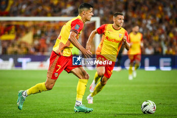 2023-08-20 - Florian SOTOCA of Lens and Przemyslaw Adam FRANKOWSKI of Lens during the French championship Ligue 1 football match between RC Lens and Stade Rennais (Rennes) on August 20, 2023 at Bollaert-Delelis stadium in Lens, France - FOOTBALL - FRENCH CHAMP - LENS V RENNES - FRENCH LIGUE 1 - SOCCER