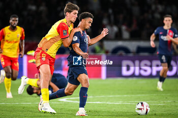 2023-08-26 - Stijn SPIERINGS of Lens and Warren ZAIRE-EMERY of PSG during the French championship Ligue 1 football match between Paris Saint-Germain and RC Lens on August 26, 2023 at Parc des Princes stadium in Paris, France - FOOTBALL - FRENCH CHAMP - PARIS SG V LENS - FRENCH LIGUE 1 - SOCCER