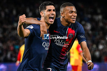 2023-08-26 - Marco ASENSIO of PSG celebrate his goal with Kylian MBAPPE of PSG during the French championship Ligue 1 football match between Paris Saint-Germain and RC Lens on August 26, 2023 at Parc des Princes stadium in Paris, France - FOOTBALL - FRENCH CHAMP - PARIS SG V LENS - FRENCH LIGUE 1 - SOCCER