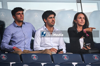 2023-08-26 - Pacho MARTINEZ son of Luis ENRIQUE and Elena CULLELL wife of Luis ENRIQUE during the French championship Ligue 1 football match between Paris Saint-Germain and RC Lens on August 26, 2023 at Parc des Princes stadium in Paris, France - FOOTBALL - FRENCH CHAMP - PARIS SG V LENS - FRENCH LIGUE 1 - SOCCER
