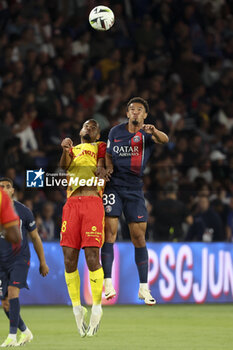 2023-08-27 - Andy Diouf of Lens, Warren Zaire-Emery of PSG during the French championship Ligue 1 football match between Paris Saint-Germain (PSG) and RC Lens (RCL) on August 26, 2023 at Parc des Princes stadium in Paris, France - FOOTBALL - FRENCH CHAMP - PARIS SG V LENS - FRENCH LIGUE 1 - SOCCER