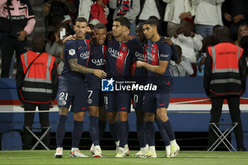 2023-08-27 - Marco Asensio of PSG celebrates his goal with Lucas Hernandez, Kylian Mbappe, Ousmane Dembele, Achraf Hakimi of PSG during the French championship Ligue 1 football match between Paris Saint-Germain (PSG) and RC Lens (RCL) on August 26, 2023 at Parc des Princes stadium in Paris, France - FOOTBALL - FRENCH CHAMP - PARIS SG V LENS - FRENCH LIGUE 1 - SOCCER