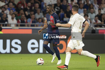 2023-09-03 - Ousmane Dembele of PSG during the French championship Ligue 1 football match between Olympique Lyonnais (Lyon, OL) and Paris Saint-Germain (PSG) on September 3, 2023 at Groupama stadium in Decines-Charpieu near Lyon, France - FOOTBALL - FRENCH CHAMP - LYON V PARIS SG - FRENCH LIGUE 1 - SOCCER