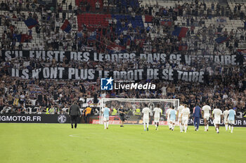 2023-09-03 - Banner against the players of Lyon during the French championship Ligue 1 football match between Olympique Lyonnais (Lyon, OL) and Paris Saint-Germain (PSG) on September 3, 2023 at Groupama stadium in Decines-Charpieu near Lyon, France - FOOTBALL - FRENCH CHAMP - LYON V PARIS SG - FRENCH LIGUE 1 - SOCCER