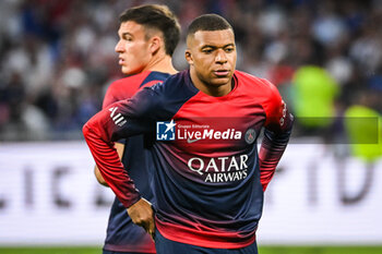 2023-09-03 - Manuel UGARTE of PSG and Kylian MBAPPE of PSG during the French championship Ligue 1 football match between Olympique Lyonnais (Lyon) and Paris Saint-Germain on September 3, 2023 at Groupama stadium in Decines-Charpieu near Lyon, France - FOOTBALL - FRENCH CHAMP - LYON V PARIS SG - FRENCH LIGUE 1 - SOCCER