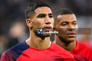 2023-09-03 - Achraf HAKIMI of PSG and Kylian MBAPPE of PSG during the French championship Ligue 1 football match between Olympique Lyonnais (Lyon) and Paris Saint-Germain on September 3, 2023 at Groupama stadium in Decines-Charpieu near Lyon, France - FOOTBALL - FRENCH CHAMP - LYON V PARIS SG - FRENCH LIGUE 1 - SOCCER