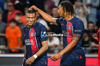 2023-09-03 - Kylian MBAPPE of PSG and Cher NDOUR of PSG during the French championship Ligue 1 football match between Olympique Lyonnais (Lyon) and Paris Saint-Germain on September 3, 2023 at Groupama stadium in Decines-Charpieu near Lyon, France - FOOTBALL - FRENCH CHAMP - LYON V PARIS SG - FRENCH LIGUE 1 - SOCCER