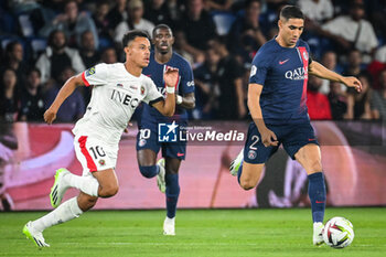 2023-09-15 - Sofiane DIOP of Nice and Achraf HAKIMI of PSG during the French championship Ligue 1 football match between Paris Saint-Germain and OGC Nice on September 15, 2023 at Parc des Princes stadium in Paris, France - FOOTBALL - FRENCH CHAMP - PARIS SG V NICE - FRENCH LIGUE 1 - SOCCER