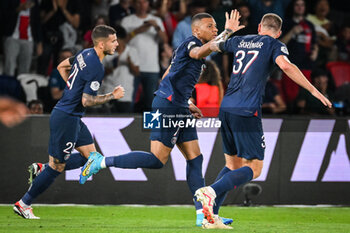 2023-09-15 - Kylian MBAPPE of PSG celebrate his goal with Lucas HERNANDEZ of PSG and Milan SKRINIAR of PSG during the French championship Ligue 1 football match between Paris Saint-Germain and OGC Nice on September 15, 2023 at Parc des Princes stadium in Paris, France - FOOTBALL - FRENCH CHAMP - PARIS SG V NICE - FRENCH LIGUE 1 - SOCCER