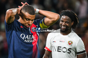 2023-09-15 - Kylian MBAPPE of PSG looks dejected and Jordan LOTOMBA of Nice during the French championship Ligue 1 football match between Paris Saint-Germain and OGC Nice on September 15, 2023 at Parc des Princes stadium in Paris, France - FOOTBALL - FRENCH CHAMP - PARIS SG V NICE - FRENCH LIGUE 1 - SOCCER