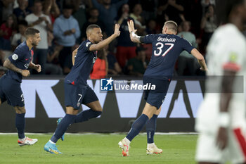 2023-09-15 - Kylian Mbappe of PSG celebrates his goal with Milan Skriniar of PSG during the French championship Ligue 1 football match between Paris Saint-Germain and OGC Nice on September 15, 2023 at Parc des Princes stadium in Paris, France - FOOTBALL - FRENCH CHAMP - PARIS SG V NICE - FRENCH LIGUE 1 - SOCCER