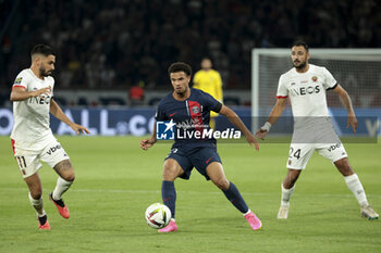 2023-09-15 - Warren Zaire-Emery of PSG between Morgan Sanson and Gaetan Laborde of Nice during the French championship Ligue 1 football match between Paris Saint-Germain and OGC Nice on September 15, 2023 at Parc des Princes stadium in Paris, France - FOOTBALL - FRENCH CHAMP - PARIS SG V NICE - FRENCH LIGUE 1 - SOCCER