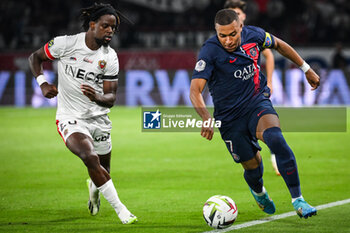 2023-09-15 - Jordan LOTOMBA of Nice and Kylian MBAPPE of PSG during the French championship Ligue 1 football match between Paris Saint-Germain and OGC Nice on September 15, 2023 at Parc des Princes stadium in Paris, France - FOOTBALL - FRENCH CHAMP - PARIS SG V NICE - FRENCH LIGUE 1 - SOCCER