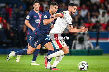 2023-09-15 - Achraf HAKIMI of PSG and Morgan SANSON of Nice during the French championship Ligue 1 football match between Paris Saint-Germain and OGC Nice on September 15, 2023 at Parc des Princes stadium in Paris, France - FOOTBALL - FRENCH CHAMP - PARIS SG V NICE - FRENCH LIGUE 1 - SOCCER