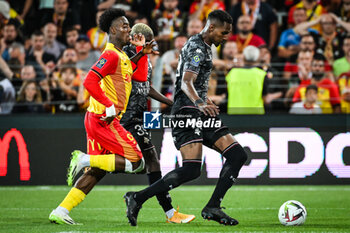 2023-09-16 - Elye WAHI of Lens and Christophe HERELLE of Metz during the French championship Ligue 1 football match between RC Lens and FC Metz on September 16, 2023 at Felix Bollaert stadium in Lens, France - FOOTBALL - FRENCH CHAMP - LENS V METZ - FRENCH LIGUE 1 - SOCCER