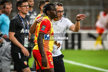 2023-09-16 - Faitout MAOUASSA of Lens and Franck HAISE of Lens during the French championship Ligue 1 football match between RC Lens and FC Metz on September 16, 2023 at Felix Bollaert stadium in Lens, France - FOOTBALL - FRENCH CHAMP - LENS V METZ - FRENCH LIGUE 1 - SOCCER