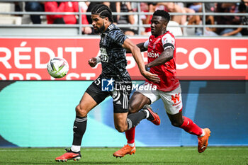 2023-09-17 - Mahdi CAMARA of Brest and Azor MATUSIWA of Reims during the French championship Ligue 1 football match between Stade De Reims and Stade Brestois on September 17, 2023 at Auguste Delaune stadium in Reims, France - FOOTBALL - FRENCH CHAMP - REIMS V BREST - FRENCH LIGUE 1 - SOCCER