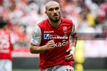 2023-09-17 - Teddy TEUMA of Reims during the French championship Ligue 1 football match between Stade De Reims and Stade Brestois on September 17, 2023 at Auguste Delaune stadium in Reims, France - FOOTBALL - FRENCH CHAMP - REIMS V BREST - FRENCH LIGUE 1 - SOCCER