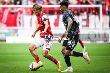 2023-09-17 - Keito NAKAMURA of Reims and Kenny LALA of Brest during the French championship Ligue 1 football match between Stade De Reims and Stade Brestois on September 17, 2023 at Auguste Delaune stadium in Reims, France - FOOTBALL - FRENCH CHAMP - REIMS V BREST - FRENCH LIGUE 1 - SOCCER