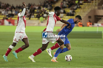 2023-09-22 - Morgan Sanson of Nice, left Mohamed Camara, Soungoutou Magassa of Monaco during the French championship Ligue 1 football match between AS Monaco and OGC Nice on September 22, 2023 at Stade Louis II in Monaco - FOOTBALL - FRENCH CHAMP - MONACO V NICE - FRENCH LIGUE 1 - SOCCER