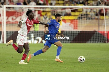2023-09-22 - Morgan Sanson of Nice, left Soungoutou Magassa of Monaco during the French championship Ligue 1 football match between AS Monaco and OGC Nice on September 22, 2023 at Stade Louis II in Monaco - FOOTBALL - FRENCH CHAMP - MONACO V NICE - FRENCH LIGUE 1 - SOCCER