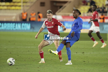 2023-09-22 - Pablo Rosario of Nice, left Aleksandr Golovin of Monaco during the French championship Ligue 1 football match between AS Monaco and OGC Nice on September 22, 2023 at Stade Louis II in Monaco - FOOTBALL - FRENCH CHAMP - MONACO V NICE - FRENCH LIGUE 1 - SOCCER