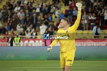 2023-09-22 - Nice goalkeeper Marcin Bulka celebrates the goal of Nice during the French championship Ligue 1 football match between AS Monaco and OGC Nice on September 22, 2023 at Stade Louis II in Monaco - FOOTBALL - FRENCH CHAMP - MONACO V NICE - FRENCH LIGUE 1 - SOCCER