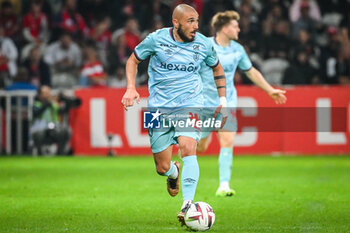 2023-09-26 - Teddy TEUMA of Reims during the French championship Ligue 1 football match between LOSC Lille and Stade de Reims on September 26, 2023 at Pierre Mauroy stadium in Villeneuve-d'Ascq near Lille, France - FOOTBALL - FRENCH CHAMP - LILLE V REIMS - FRENCH LIGUE 1 - SOCCER