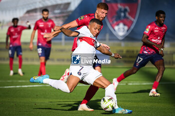 2023-09-30 - Kylian MBAPPE of PSG and Maximiliano CAUFRIEZ of Clermont during the French championship Ligue 1 football match between Clermont Foot 63 and Paris Saint-Germain on September 30, 2023 at Gabriel-Montpied stadium in Clermont-Ferrand, France - FOOTBALL - FRENCH CHAMP - CLERMONT V PARIS SG - FRENCH LIGUE 1 - SOCCER