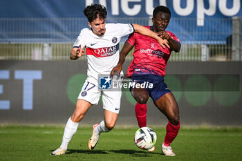 2023-09-30 - Vitor MACHADO FERREIRA (Vitinha) of PSG and Cheick OUMAR KONATE of Clermont during the French championship Ligue 1 football match between Clermont Foot 63 and Paris Saint-Germain on September 30, 2023 at Gabriel-Montpied stadium in Clermont-Ferrand, France - FOOTBALL - FRENCH CHAMP - CLERMONT V PARIS SG - FRENCH LIGUE 1 - SOCCER