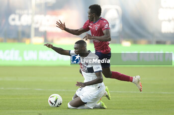 2023-09-30 - Randal Kolo Muani of PSG, Cheick Oumar Konate of Clermont during the French championship Ligue 1 football match between Clermont Foot 63 and Paris Saint-Germain (PSG) on September 30, 2023 at Stade Gabriel-Montpied in Clermont-Ferrand, France - FOOTBALL - FRENCH CHAMP - CLERMONT V PARIS SG - FRENCH LIGUE 1 - SOCCER
