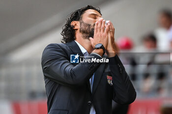 2023-10-01 - Fabio GROSSO of Lyon looks dejected during the French championship Ligue 1 football match between Stade de Reims and Olympique Lyonnais on October 1, 2023 at Auguste Delaune stadium in Reims, France - FOOTBALL - FRENCH CHAMP - REIMS V LYON - FRENCH LIGUE 1 - SOCCER
