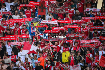 2023-10-01 - Supporters of Reims during the French championship Ligue 1 football match between Stade de Reims and Olympique Lyonnais on October 1, 2023 at Auguste Delaune stadium in Reims, France - FOOTBALL - FRENCH CHAMP - REIMS V LYON - FRENCH LIGUE 1 - SOCCER