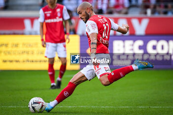 2023-10-01 - Teddy TEUMA of Reims during the French championship Ligue 1 football match between Stade de Reims and Olympique Lyonnais on October 1, 2023 at Auguste Delaune stadium in Reims, France - FOOTBALL - FRENCH CHAMP - REIMS V LYON - FRENCH LIGUE 1 - SOCCER