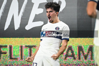 2023-10-08 - Vitor MACHADO FERREIRA (Vitinha) of PSG celebrates his goal during the French championship Ligue 1 football match between Stade Rennais (Rennes) and Paris Saint-Germain on October 8, 2023 at Roazhon Park in Rennes, France - FOOTBALL - FRENCH CHAMP - RENNES V PARIS SG - FRENCH LIGUE 1 - SOCCER