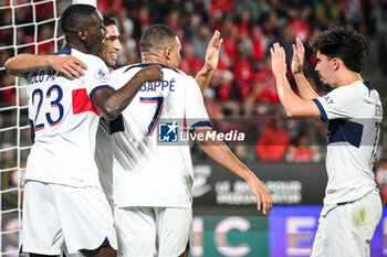 2023-10-08 - Randal KOLO MUANI of PSG celebrate his goal with Achraf HAKIMI of PSG, Kylian MBAPPE of PSG and Vitor MACHADO FERREIRA (Vitinha) of PSG during the French championship Ligue 1 football match between Stade Rennais (Rennes) and Paris Saint-Germain on October 8, 2023 at Roazhon Park in Rennes, France - FOOTBALL - FRENCH CHAMP - RENNES V PARIS SG - FRENCH LIGUE 1 - SOCCER
