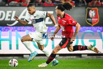 2023-10-08 - Kylian MBAPPE of PSG and Arthur THEATE of Rennes during the French championship Ligue 1 football match between Stade Rennais (Rennes) and Paris Saint-Germain on October 8, 2023 at Roazhon Park in Rennes, France - FOOTBALL - FRENCH CHAMP - RENNES V PARIS SG - FRENCH LIGUE 1 - SOCCER