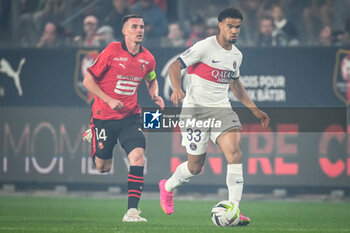 2023-10-08 - Benjamin BOURIGEAUD of Rennes and Warren ZAIRE-EMERY of PSG during the French championship Ligue 1 football match between Stade Rennais (Rennes) and Paris Saint-Germain on October 8, 2023 at Roazhon Park in Rennes, France - FOOTBALL - FRENCH CHAMP - RENNES V PARIS SG - FRENCH LIGUE 1 - SOCCER