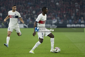 2023-10-08 - Ousmane Dembele, left Achraf Hakimi of PSG during the French championship Ligue 1 football match between Stade Rennais (Rennes) and Paris Saint-Germain on October 8, 2023 at Roazhon Park in Rennes, France - FOOTBALL - FRENCH CHAMP - RENNES V PARIS SG - FRENCH LIGUE 1 - SOCCER