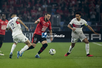 2023-10-08 - Amine Gouiri of Rennes, Marquinhos of PSG during the French championship Ligue 1 football match between Stade Rennais (Rennes) and Paris Saint-Germain on October 8, 2023 at Roazhon Park in Rennes, France - FOOTBALL - FRENCH CHAMP - RENNES V PARIS SG - FRENCH LIGUE 1 - SOCCER